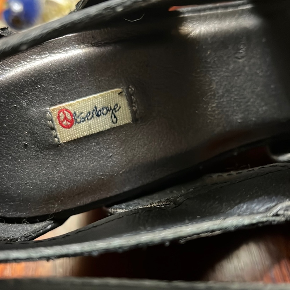 Wedge heels. Zip up front. Open toe.